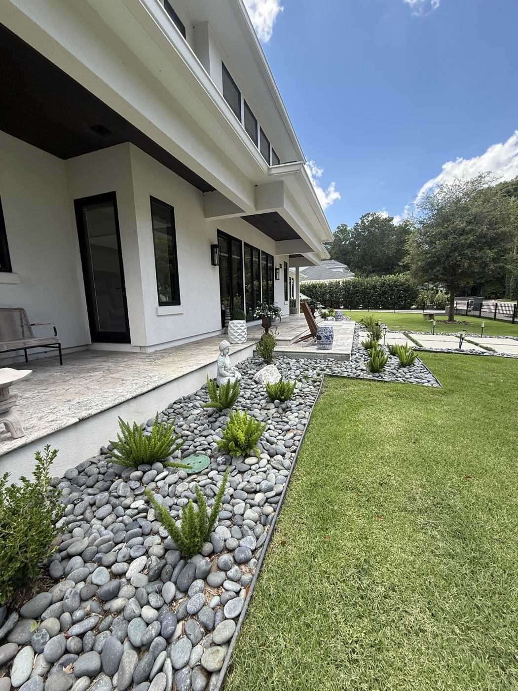 River-stone garden along the porch